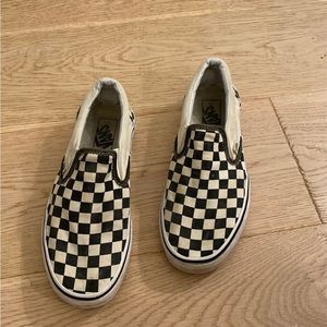 Checkered Vans slip ons